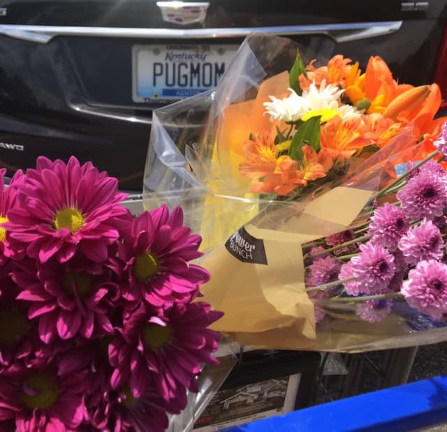 flowers in grocery basket